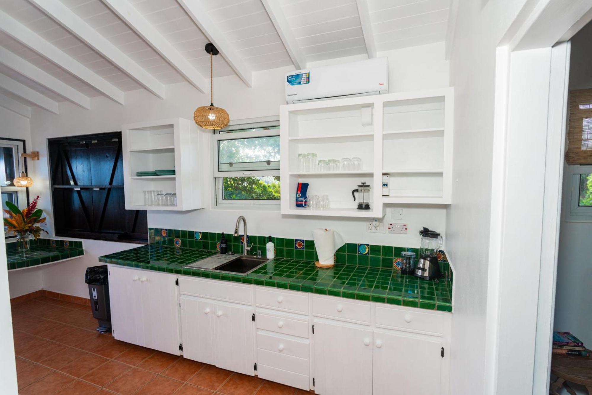Hodges Bay House Apartment Calibishie Exterior photo
